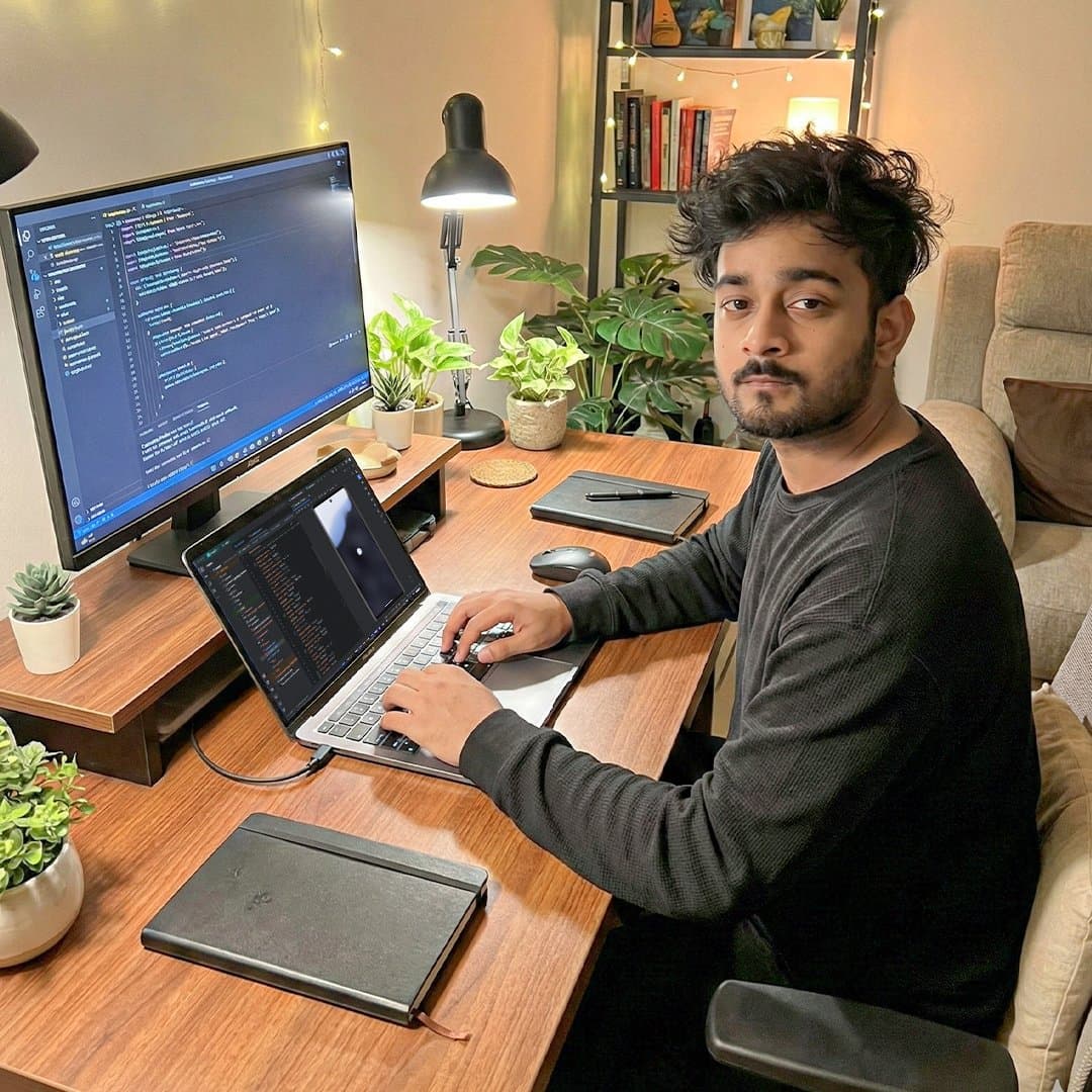 Sunny Alam working at a desk